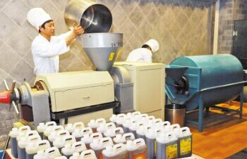 開個小油坊，榨油機技術(shù)很重要(圖1)